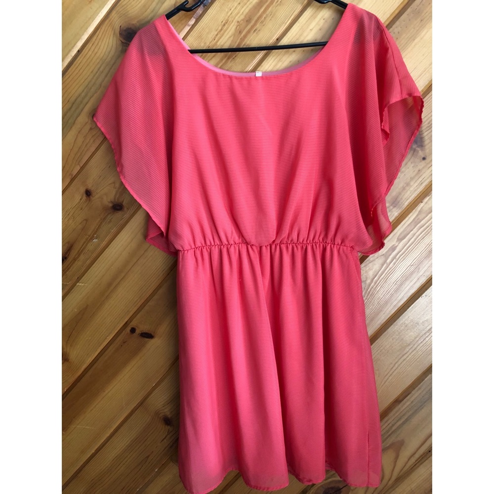 Flutter-sleeved, bright Miami dress